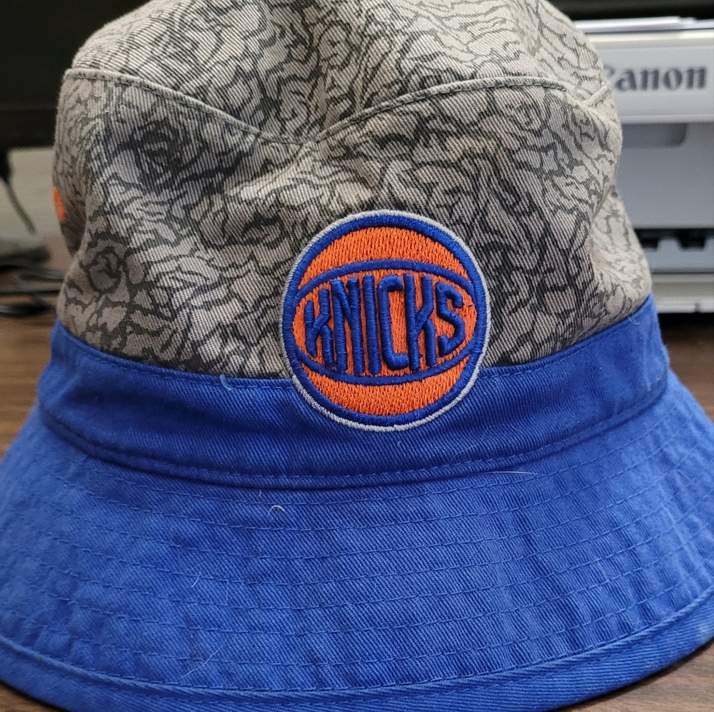 NY Knicks bucket hat.